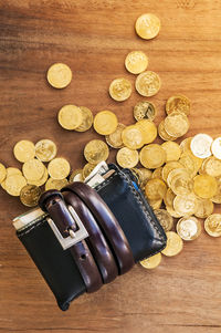 High angle view of coins on table