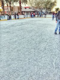 People walking on road in city