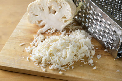 High angle view of chopped bread on cutting board