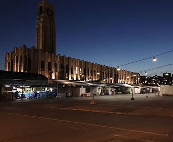 View of city lit up at night