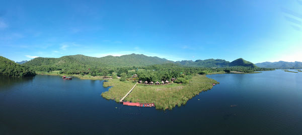 Scenic view of lake against blue sky