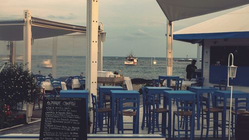 Table and sea against sky