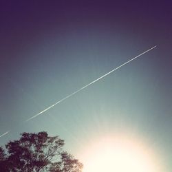 Low angle view of vapor trail in sky