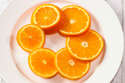 High angle view of orange fruit on table