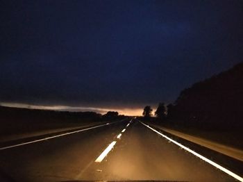Highway against sky at dusk