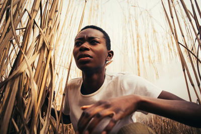 Portrait of young man looking away