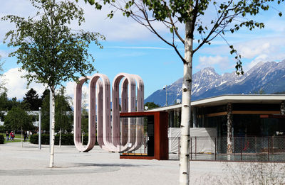 View of playground against cloudy sky