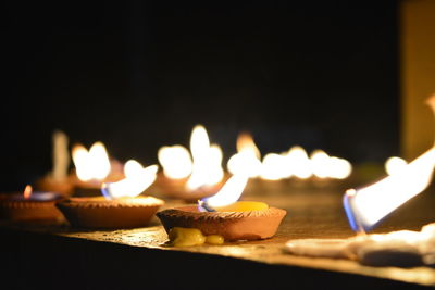 Close-up of burning candles