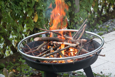 Close-up of fire on barbecue grill