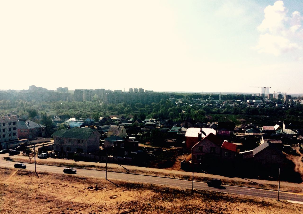 building exterior, architecture, built structure, house, residential structure, residential building, residential district, sky, townscape, town, city, high angle view, cityscape, crowded, clear sky, day, roof, outdoors, sunlight, copy space