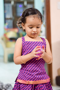 Girl standing at home