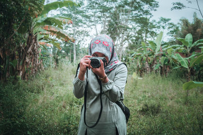 Woman photographing