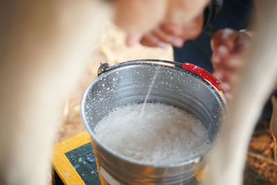 Close-up of hand holding drink