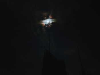 Low angle view of building against sky at night