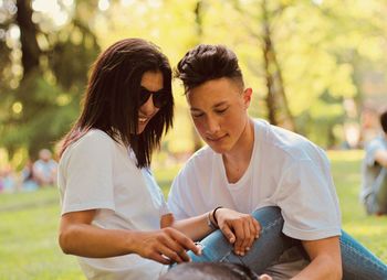 Young couple looking away