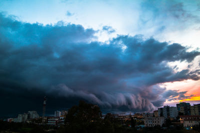 Storm clouds over city