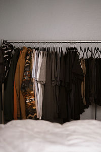 Clothes hanging on rack in store