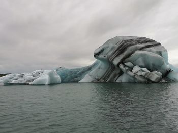 Scenic view of frozen sea against sky