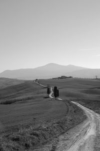 Scenic view of field against clear sky