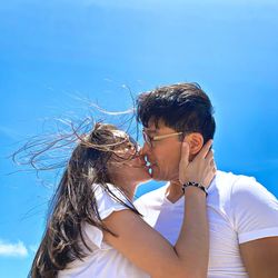 A soul meets another soul through a lovers lips