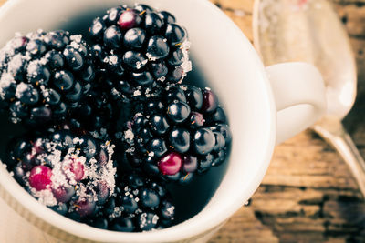 Close-up of fruits in bowl on table