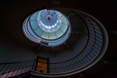 Low angle view of spiral staircase in building