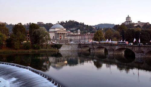 Overview of the po river at sunset, turin, italy