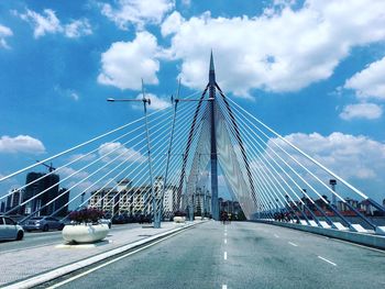 Road against cloudy sky