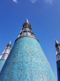 Low angle view of cathedral against blue sky