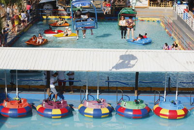 High angle view of people at swimming pool