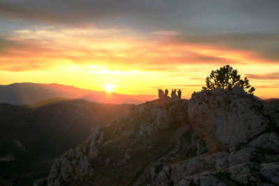 Scenic view of mountains against sky during sunset