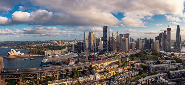 Circular quay business district in sydney australia with a ferry entering the harbor