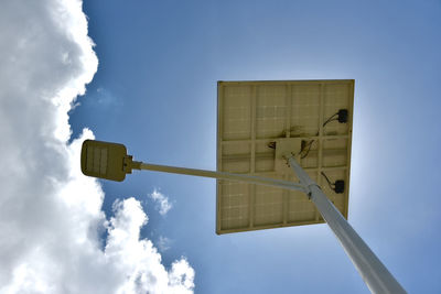 Low angle view of street light against sky