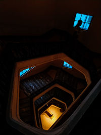 Low angle view of illuminated staircase in building