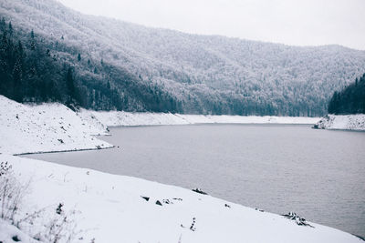 High angle view of frozen lake against sky