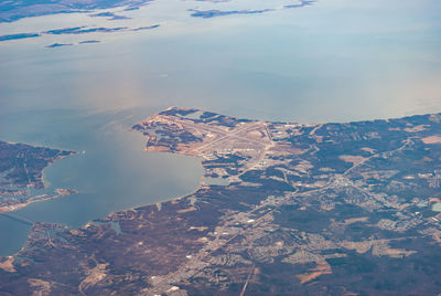 High angle view of city by sea