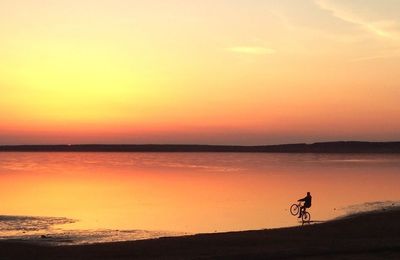 Scenic view of sea at sunset