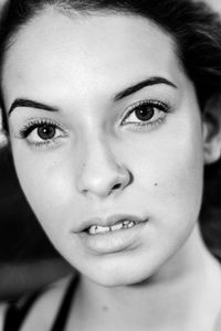 Close-up portrait of young woman