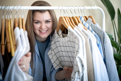 Midsection of woman standing in store