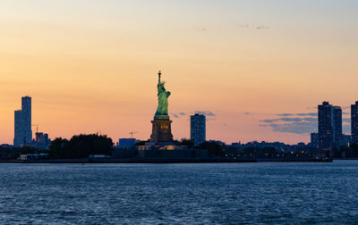 Statute of liberty at sunset