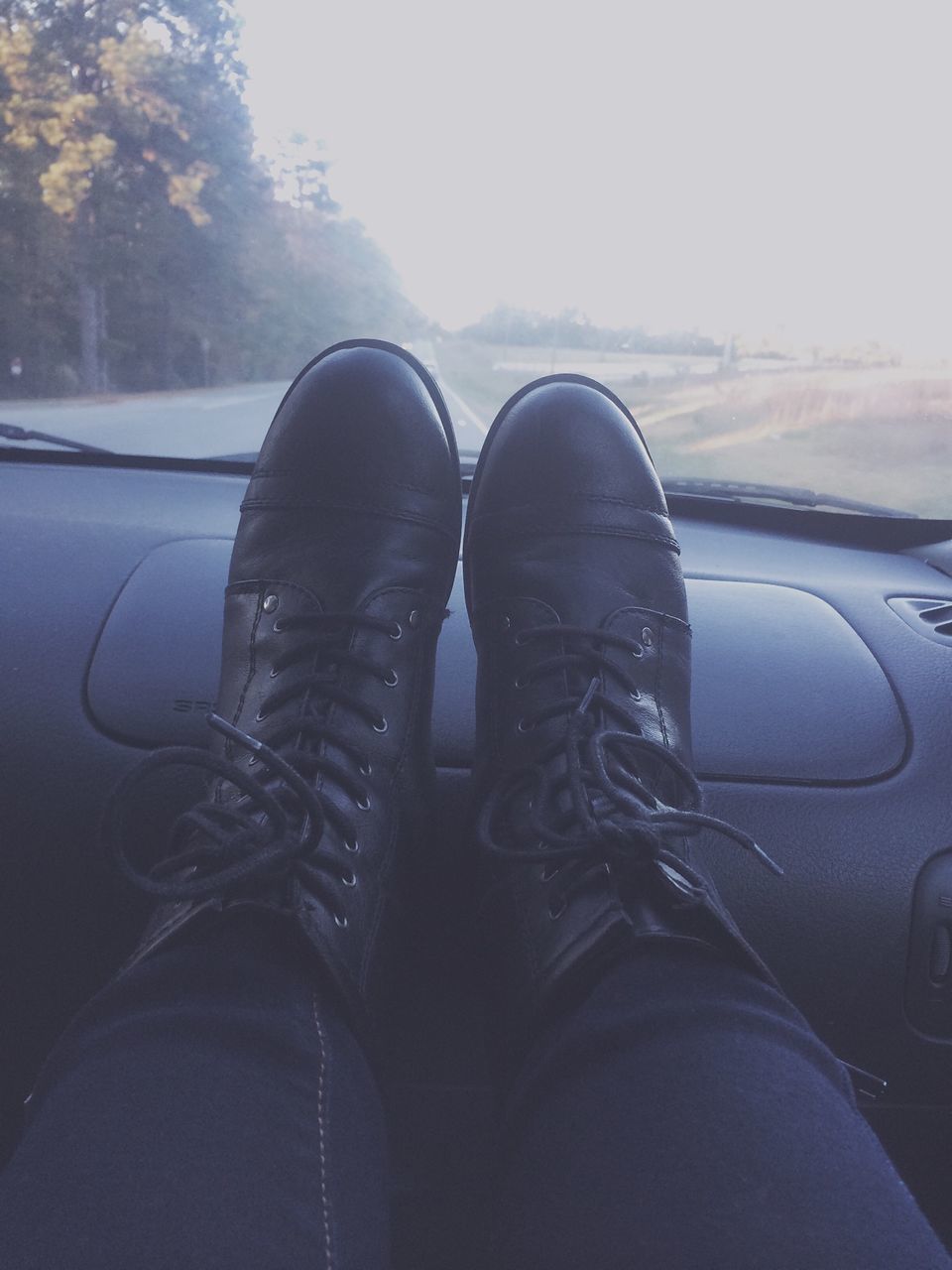 low section, shoe, person, personal perspective, transportation, footwear, jeans, mode of transport, lifestyles, human foot, part of, land vehicle, vehicle interior, leisure activity, car, men, car interior