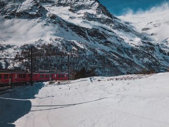Train passing through snowy landscape