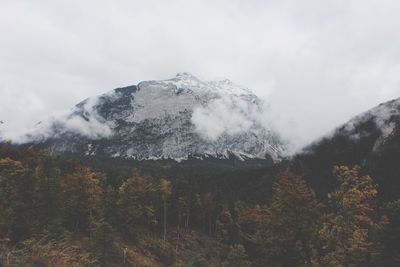 Scenic view of landscape and mountains against sky