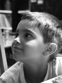 Close-up of boy looking away