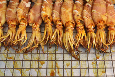 Close-up of calamari for sale at fish market