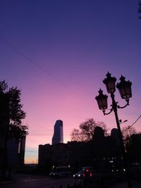 Cars on street at dusk