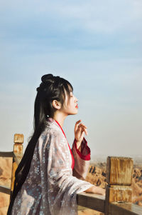 Young woman drinking water