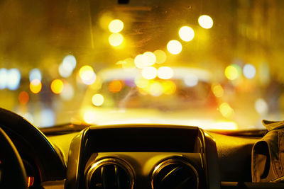 Close-up of illuminated car at night