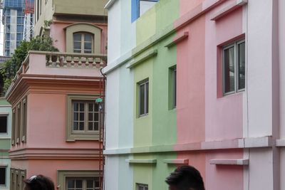 Low angle view of multi colored buildings in city