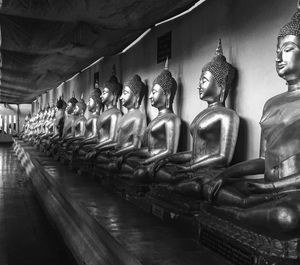 Sculpture of buddha statues in building